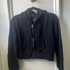 Black, cropped zip up from Brandy Melville! one size!
